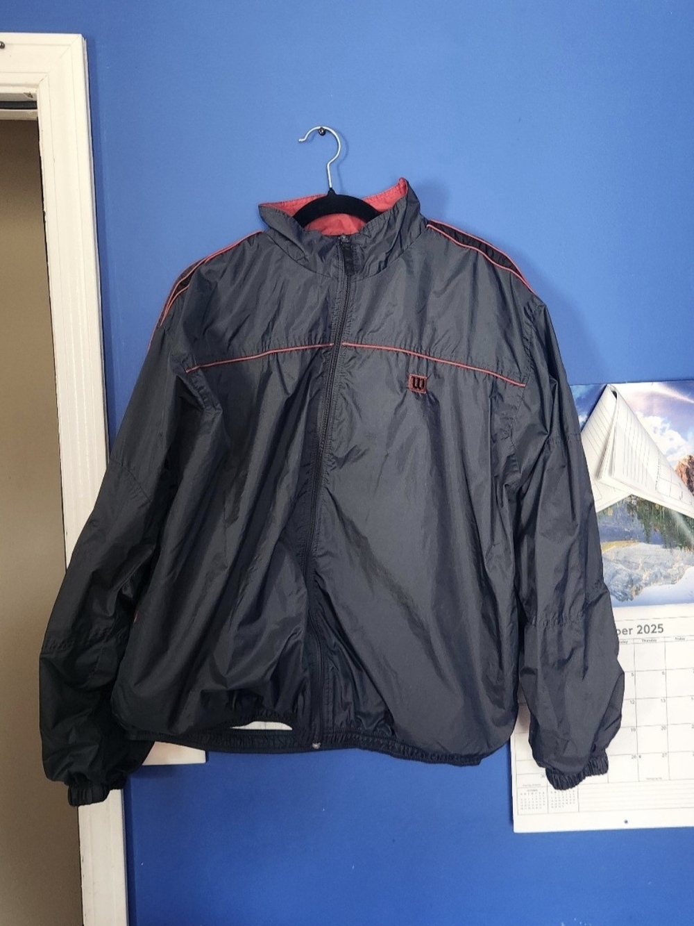 Wilson Men's Black Windbreaker with Red Accents